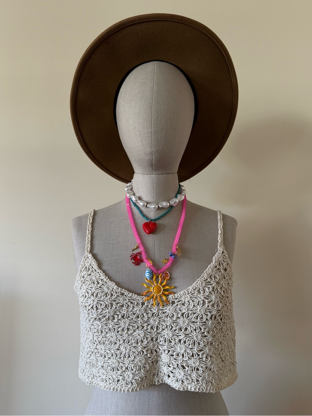 Women’s Brown Wide-Brim Hat with Layered Colorful Necklaces